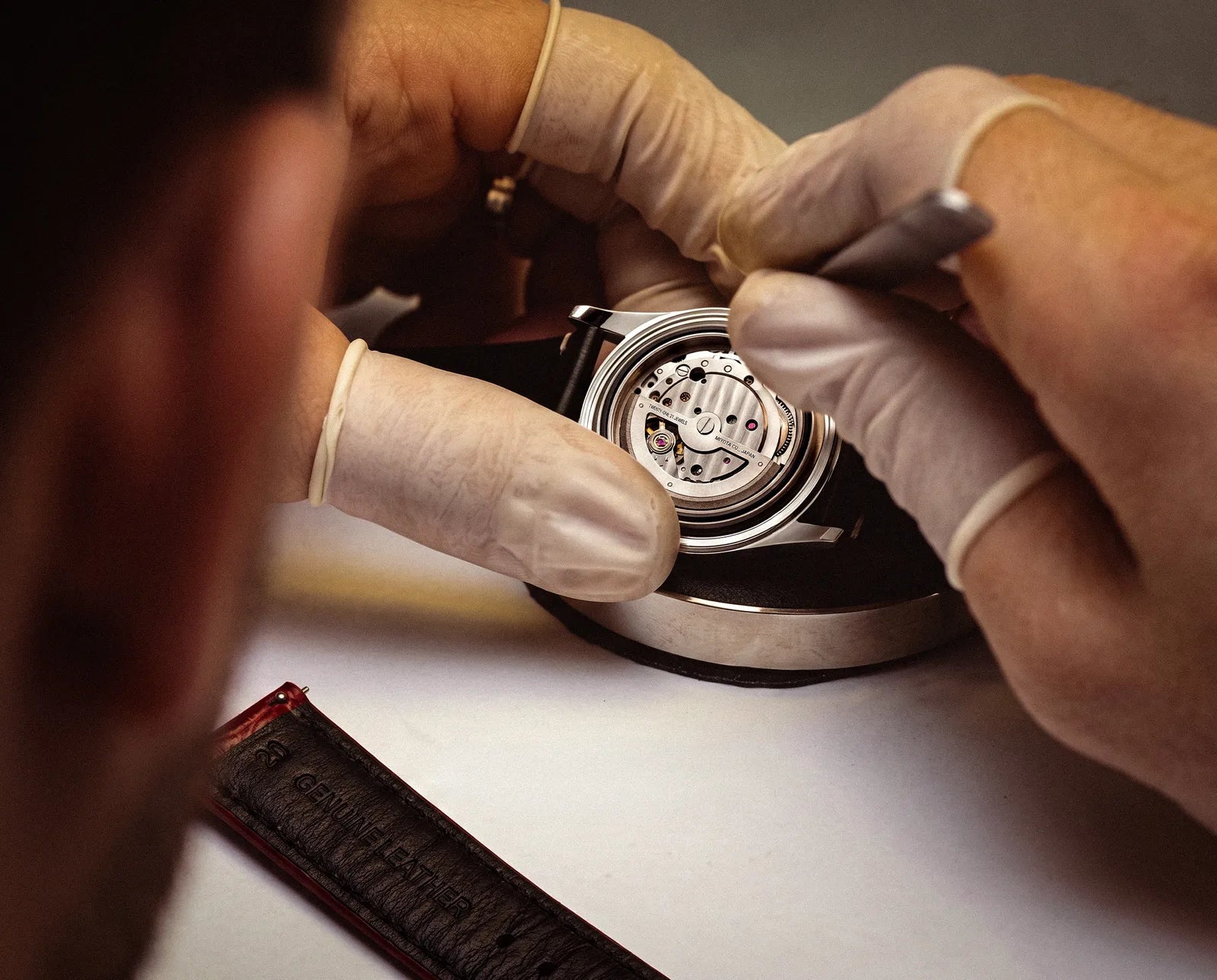 A Carter Farrago watchmaker at the bench